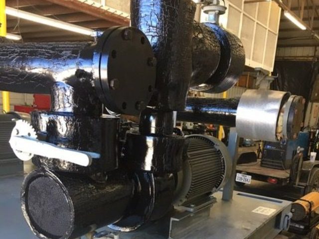 Two used Bell & Gossett 15HP Pumps skid mounted with Suction Diffusers, Isolation Valves, and Supply and Return Headers